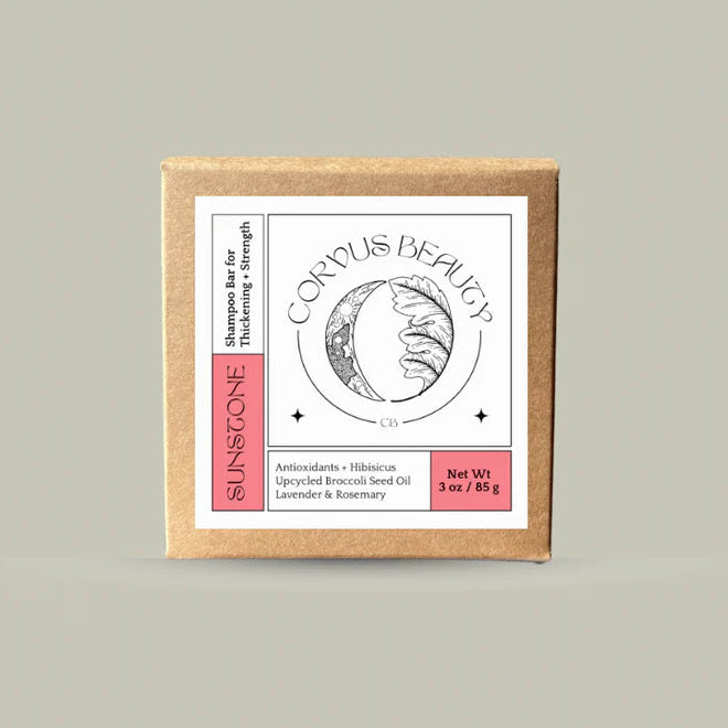 Bar of soap in a cardboard box with 'Corvus Beauty' branding on a beige background